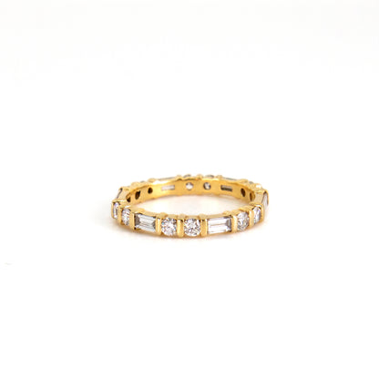 Baguette and round diamond eternity ring