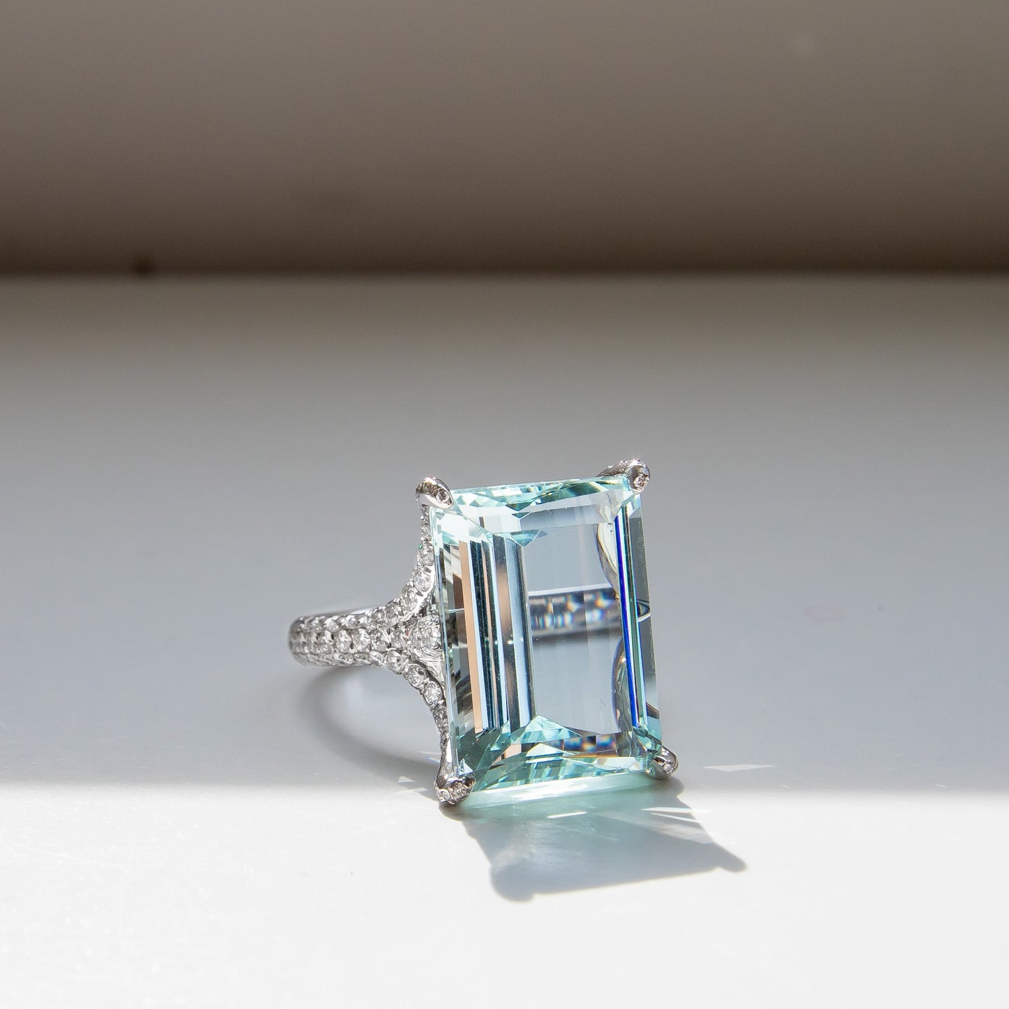 11 carat Emerald cut aquamarine and diamond  pave ring in 18k platinum by Valentina Fine Jewellery Hong Kong. Global free shipping including USA, Dubai, Singapore, Australia and UK