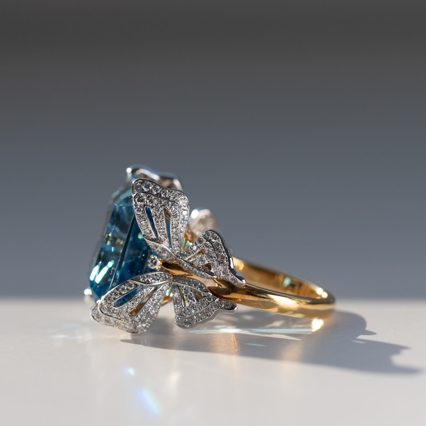 Statement cocktail ring with topaz and diamonds in 18k gold and platinum by Valentina Fine Jewellery Hong Kong. Global free shipping including USA, UK, Dubai, Qatar and Australia.