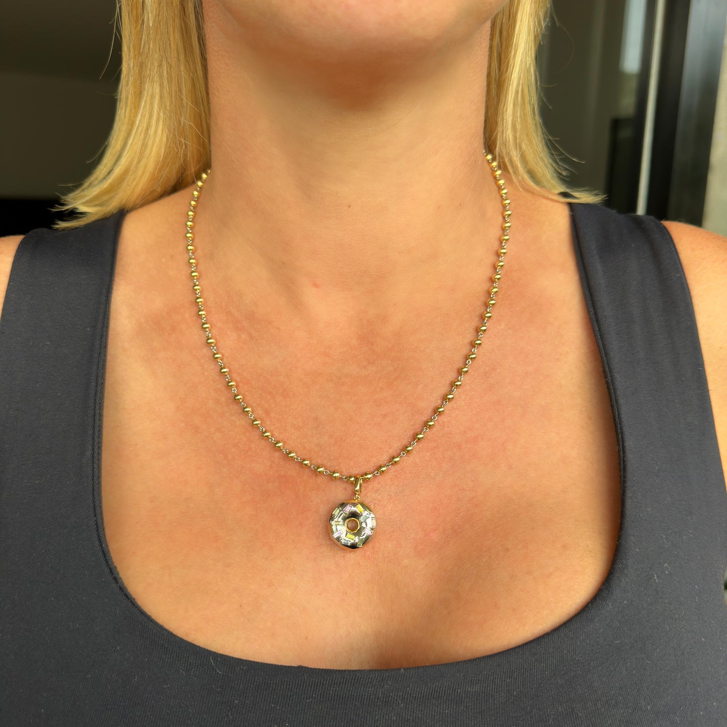 Gold and platinum doughnut aka donut pendant charm with no heat natural sapphires by Valentina Fine Jewellery. Global free shipping including UK, USA and Australia. Shown with our gold ball chain necklace.