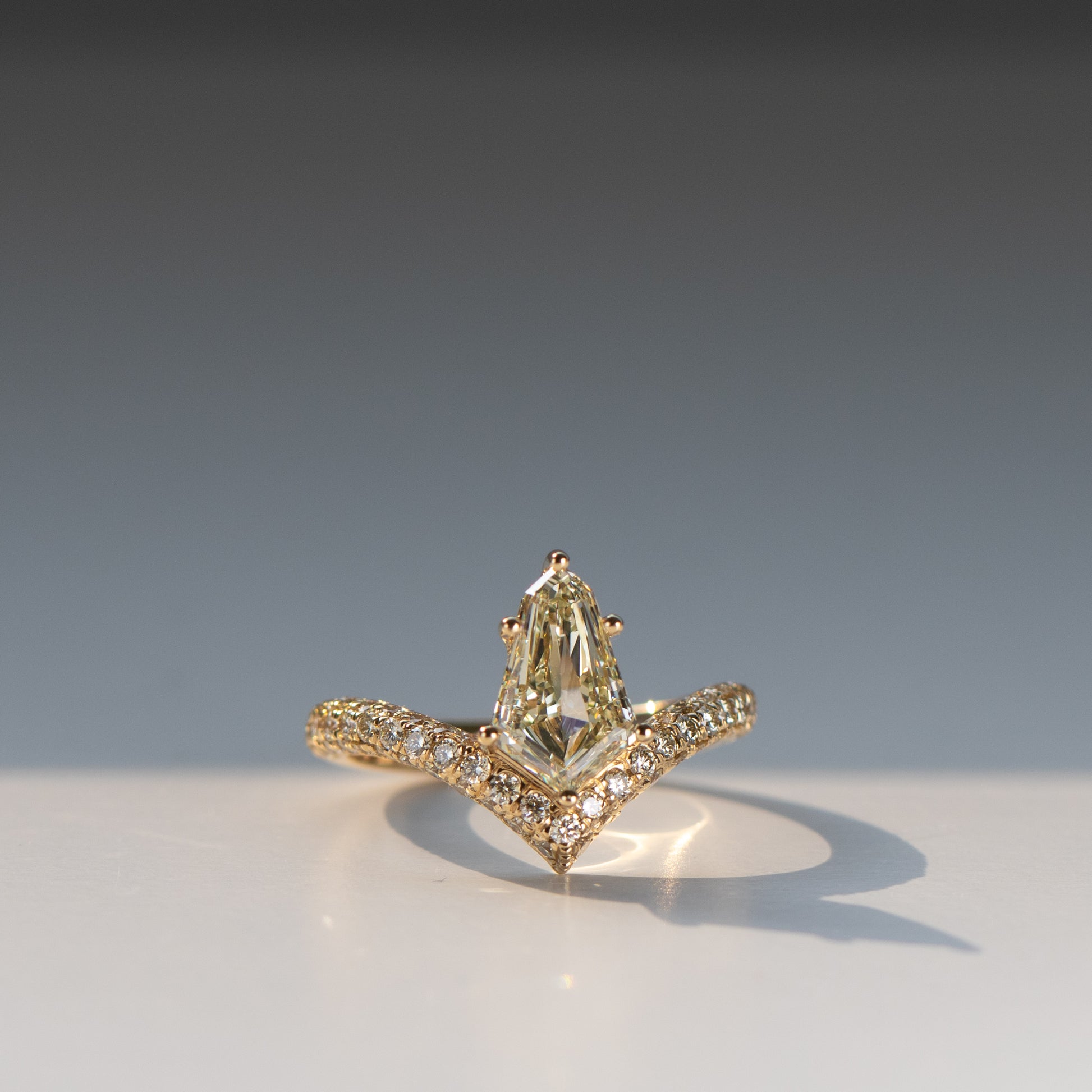 Kite Shield Cut natural diamond engagement ring in 18k yellow gold by Valentina Fine Jewellery HK. Global free shipping to all USA states, Singapore, China, Taiwan and Australia. Yellow diamond ring.