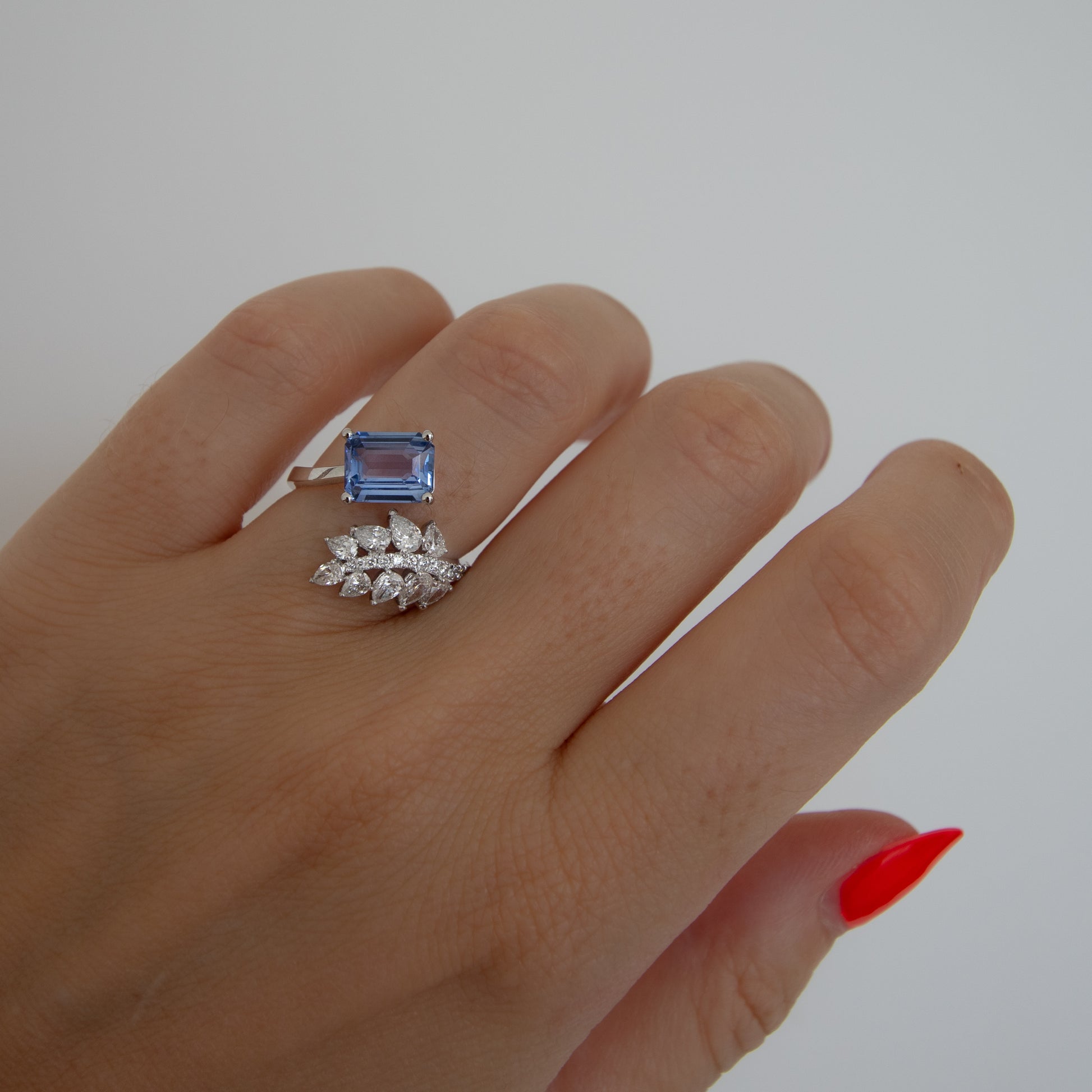 Beautiful no heat cornflower blue sapphire and diamond cross over open ring by Valentina Fine Jewellery Hong Kong. Global free delivery including USA, Australia and New Zealand.