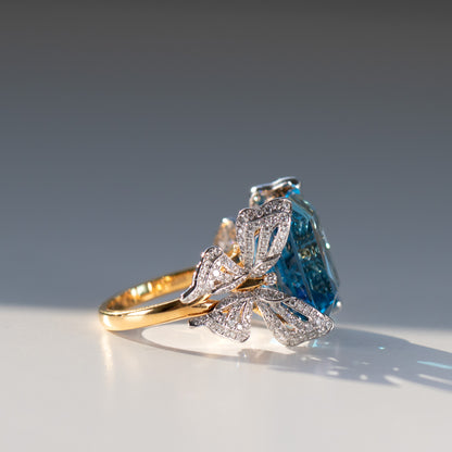 15 carat blue topaz and diamond butterfly ring in 18k gold and platinum by Valentina Fine Jewellery Hong Kong. Global free shipping including USA, UK, Dubai, Qatar and Australia.