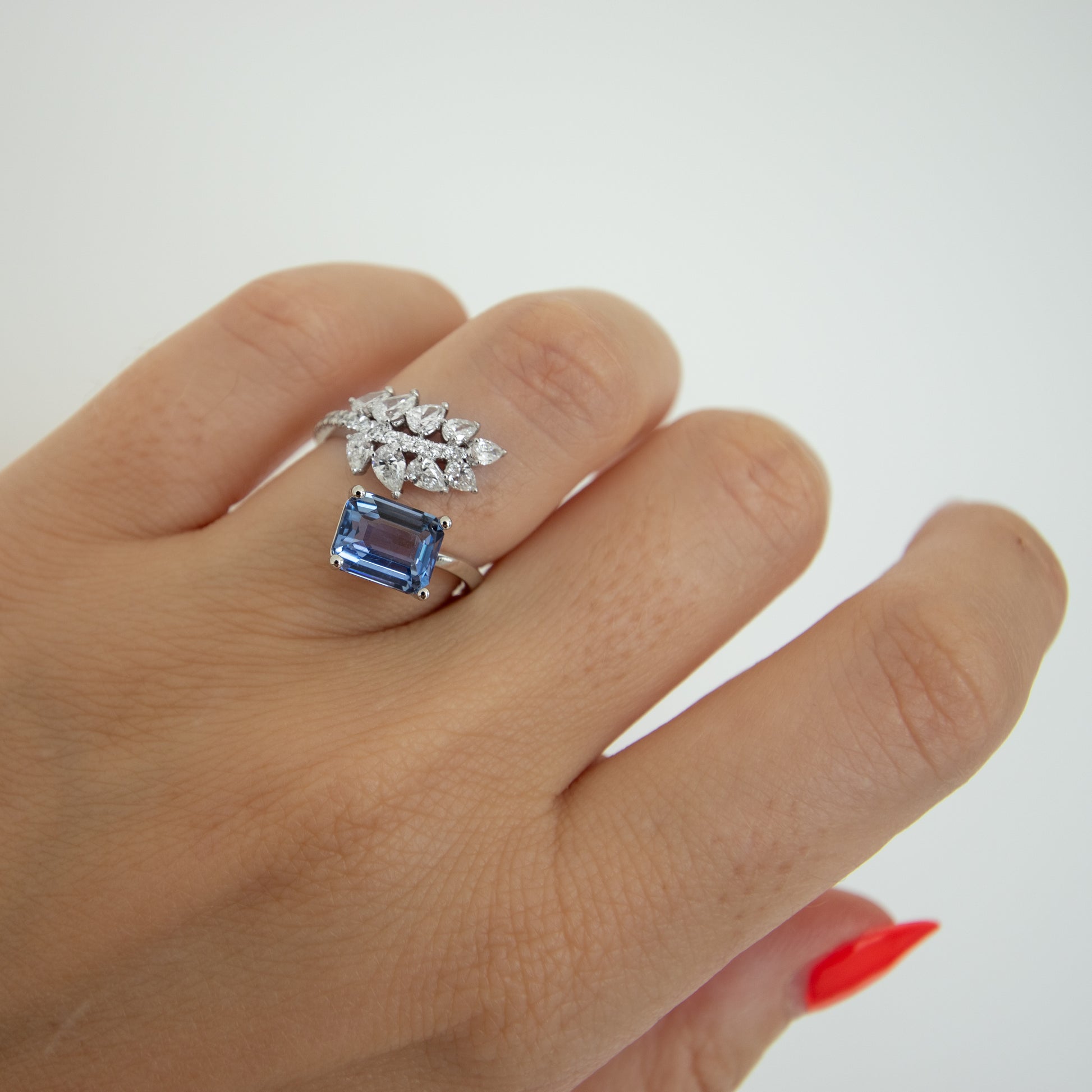 Beautiful no heat cornflower blue sapphire and diamond cross over open ring by Valentina Fine Jewellery Hong Kong. Global free delivery including USA, Australia and New Zealand.