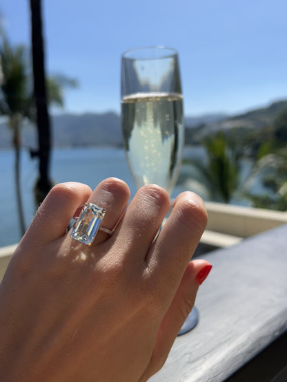 Pale blue emerald cut aquamarine and diamond ring