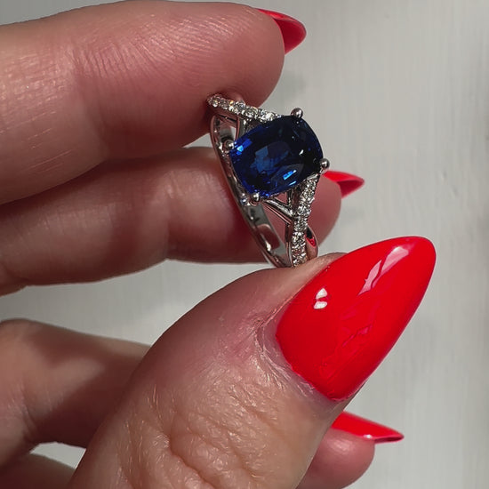 2 carat blue cushion cut sapphire and diamond love twist engagement ring in platinum by Valentina Fine Jewellery HK. Global free shipping including USA, UK, Singapore and Australia. Bespoke engagement ring service