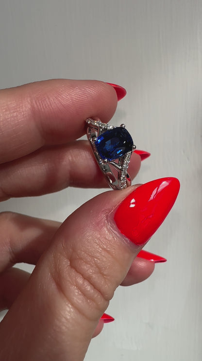 2 carat blue cushion cut sapphire and diamond love twist engagement ring in platinum by Valentina Fine Jewellery HK. Global free shipping including USA, UK, Singapore and Australia. Bespoke engagement ring service