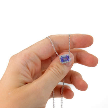 Tanzanite and diamond halo necklace