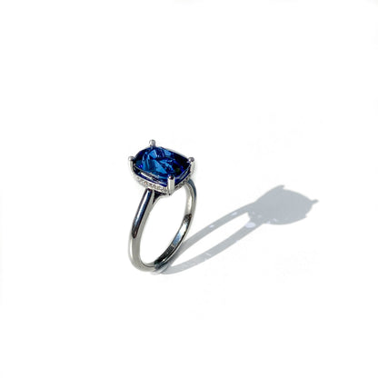 Cushion cut sapphire and diamond ring