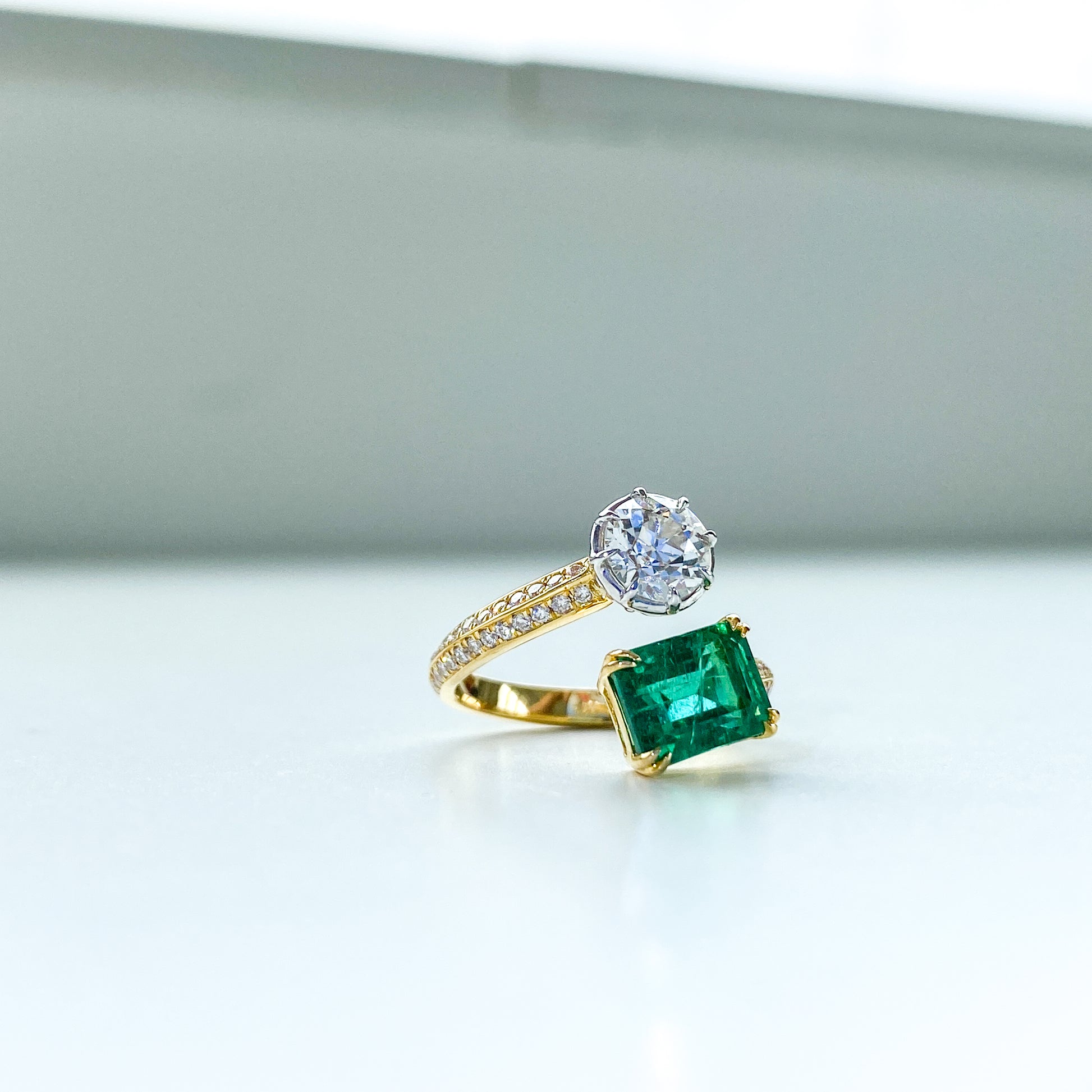 1920s Platinum and Diamond Toi Et Moi Ring (with Emeralds)